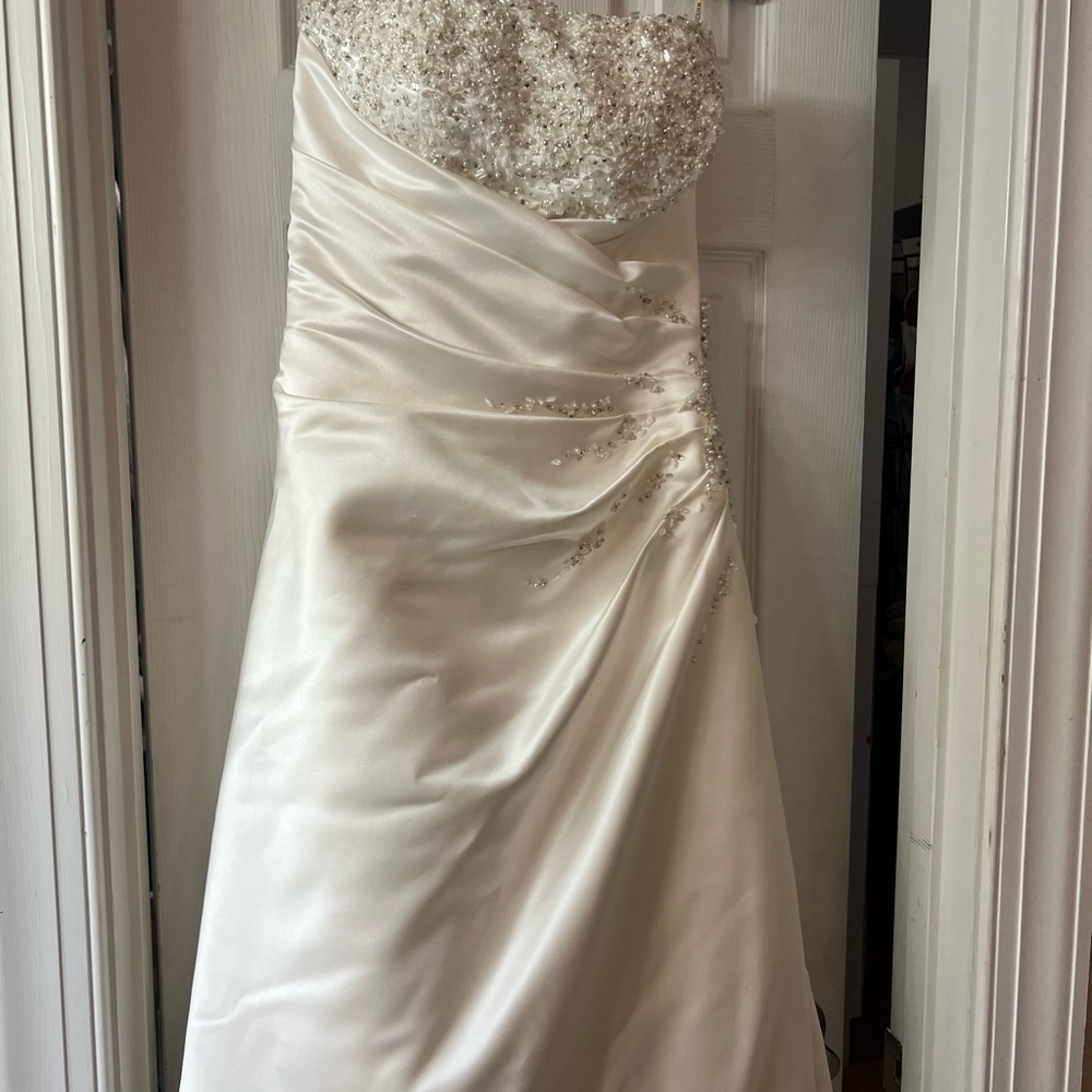 Maggie Sottero Elegant Strapless Wedding Gown - Picture 6 of 8